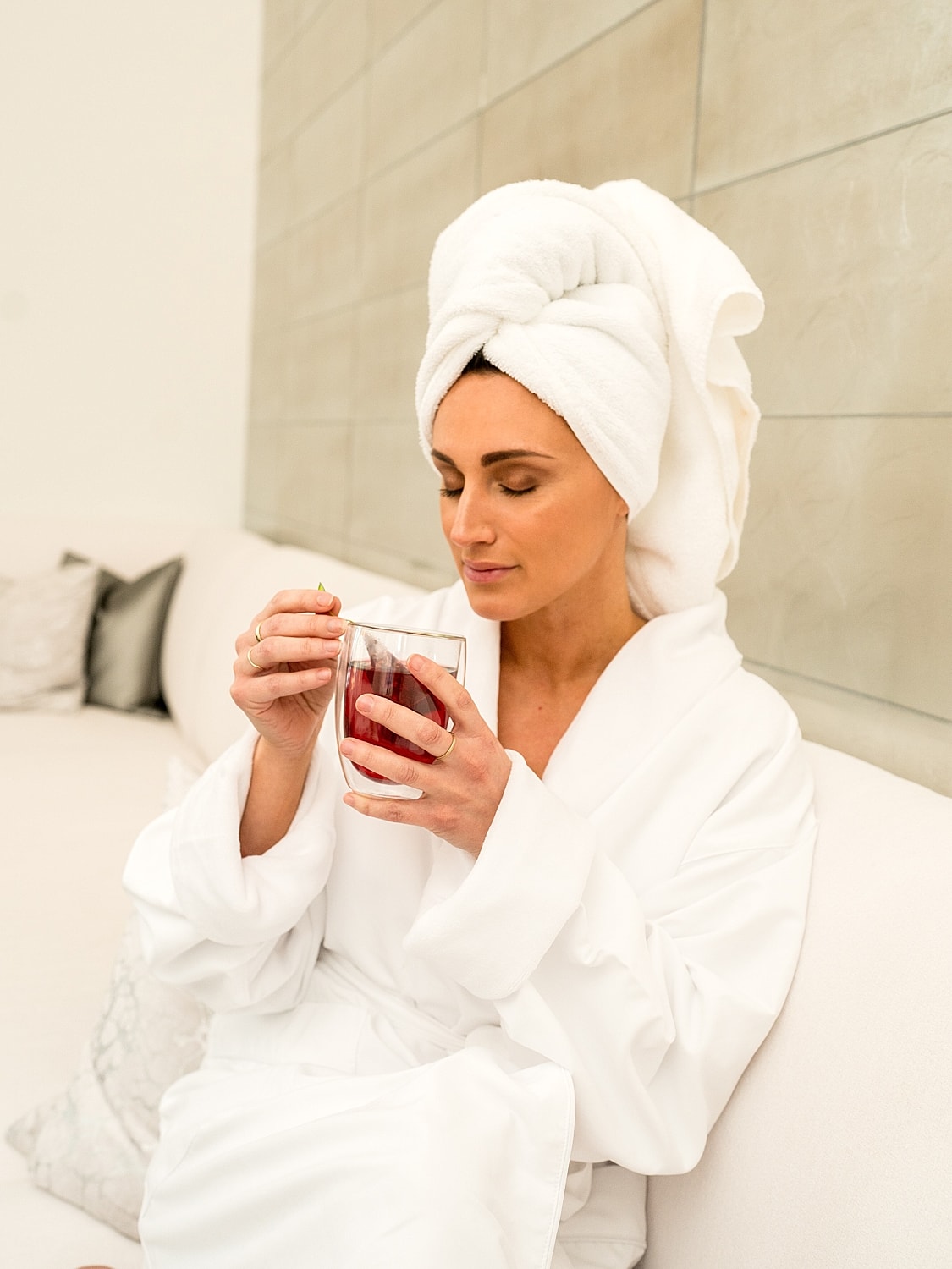 Black and white portrait of a woman in shirt.