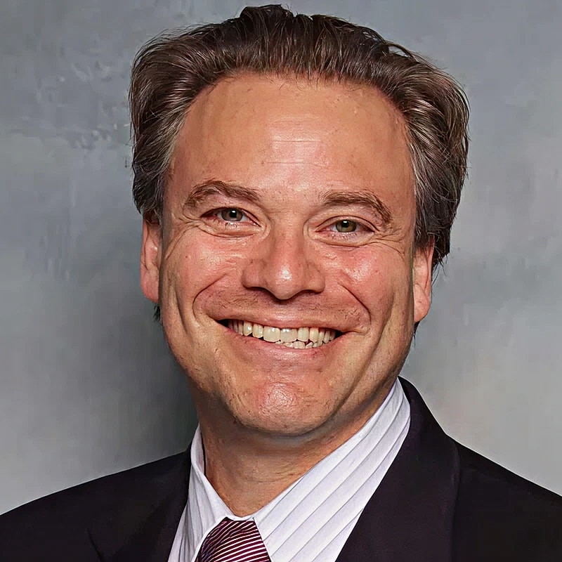 Medical professional preparing patient for procedure.