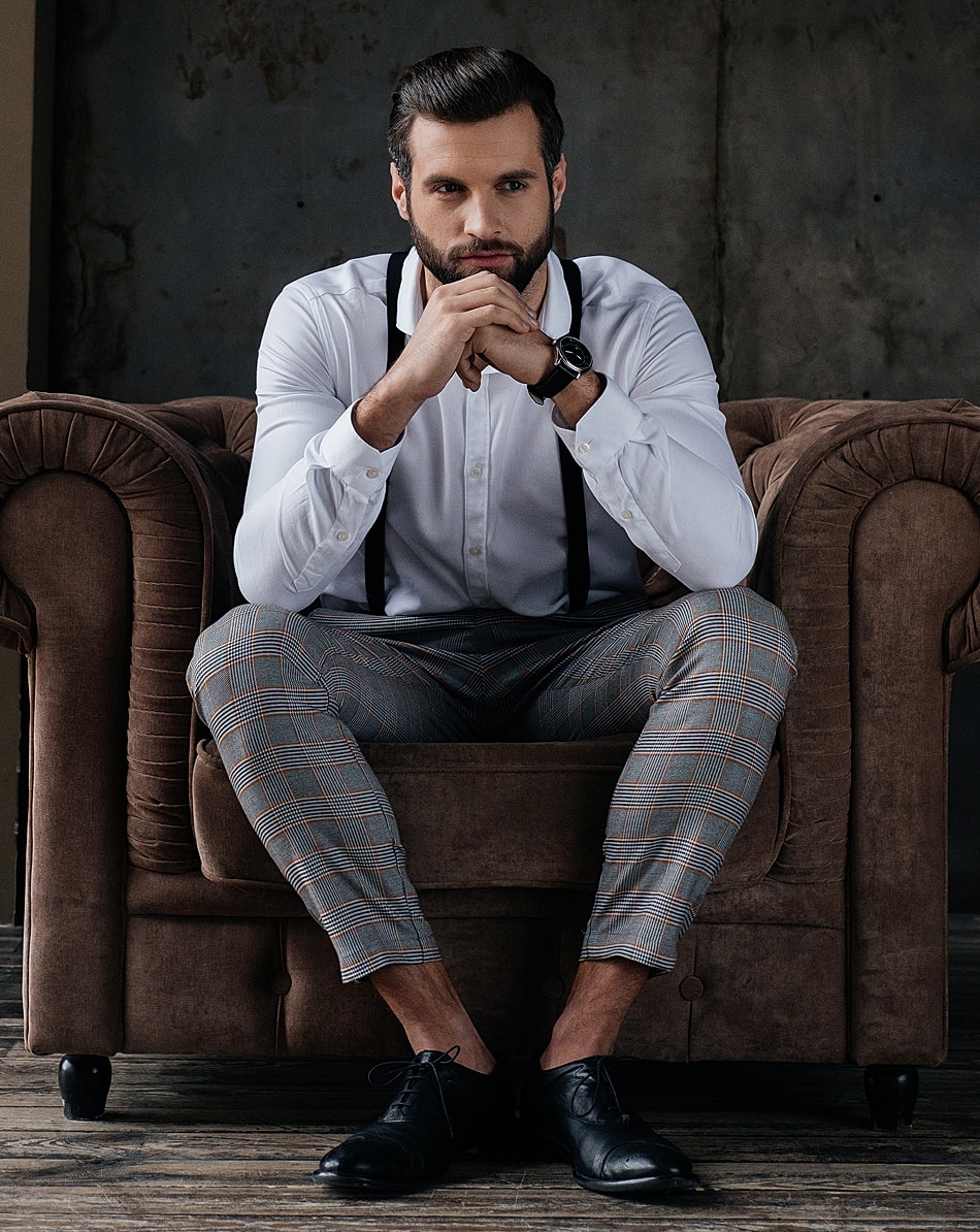 Woman with styled hair and natural makeup.