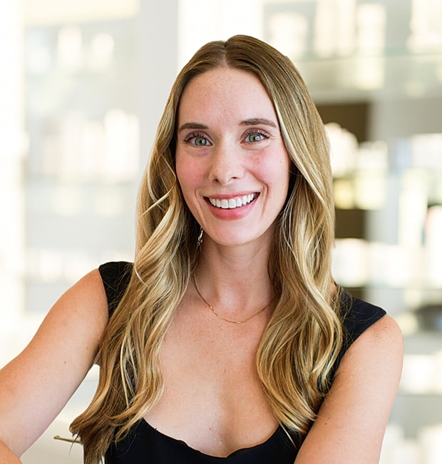 Smiling woman with long hair in beauty setting