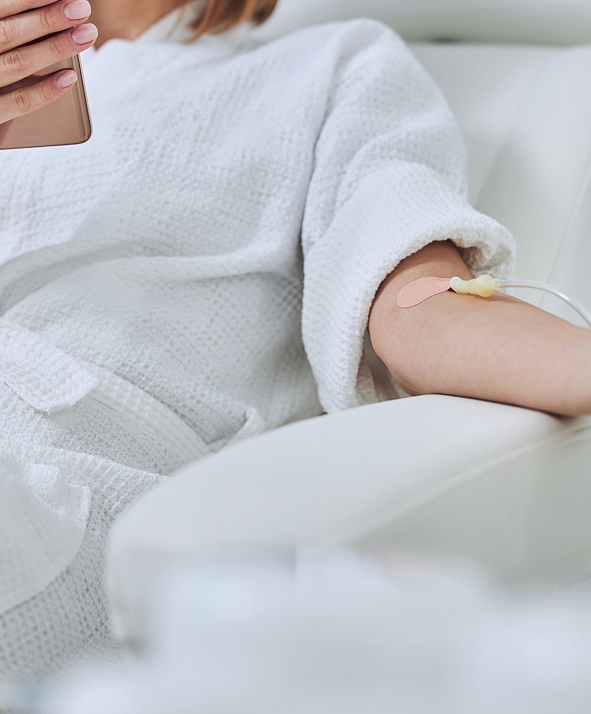 Medical professional preparing patient for procedure.