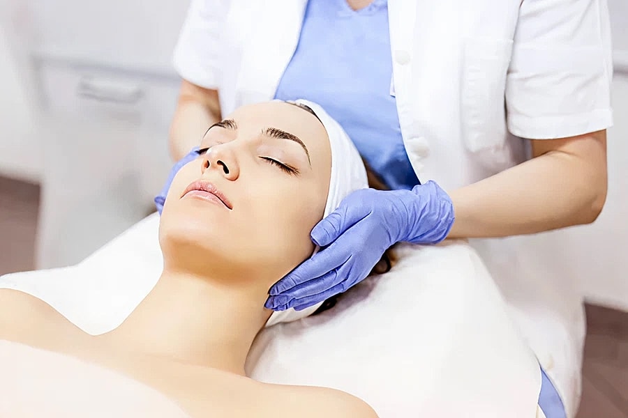 Facial treatment in a skincare clinic setting.