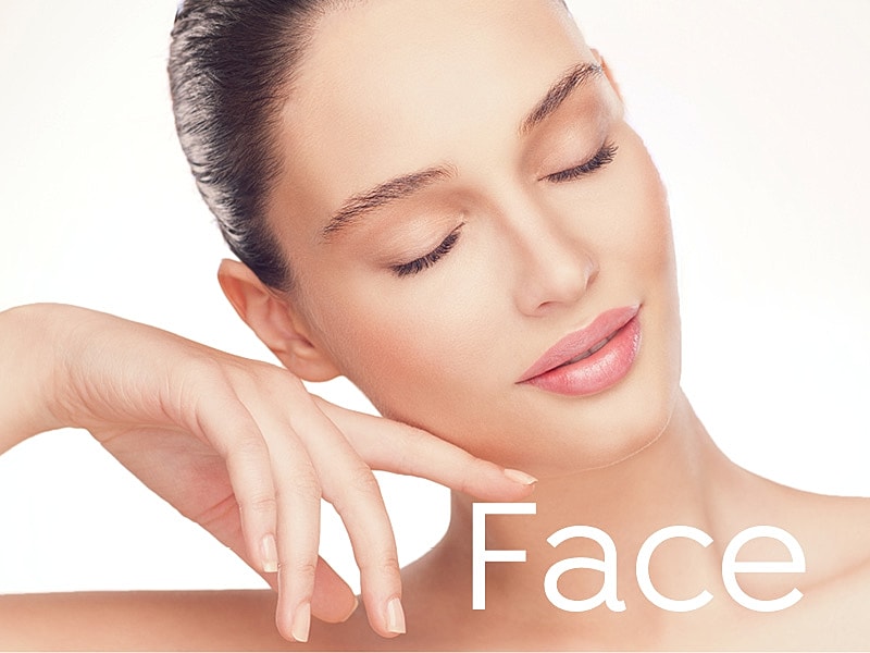 Glowing face with relaxed expression and hand styling.