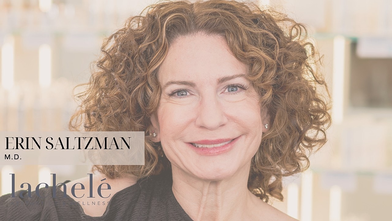 Medical aesthetician discussing skincare in clinic.