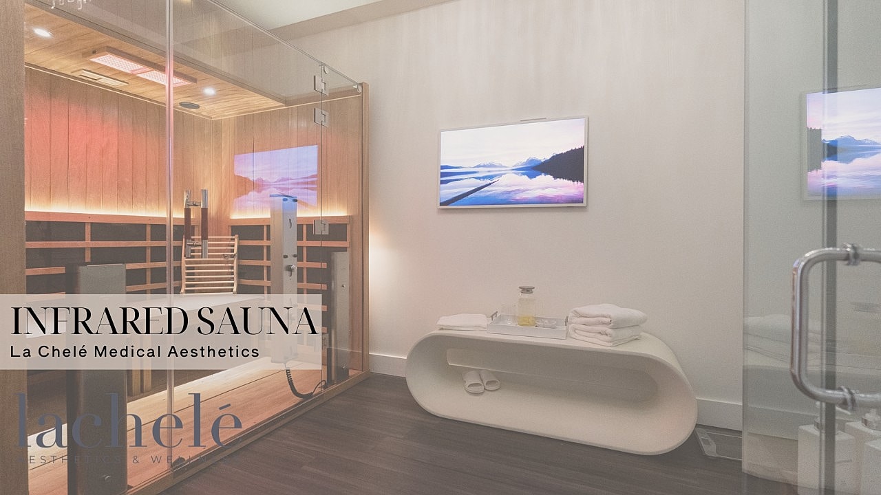 Man exiting a red infrared sauna.