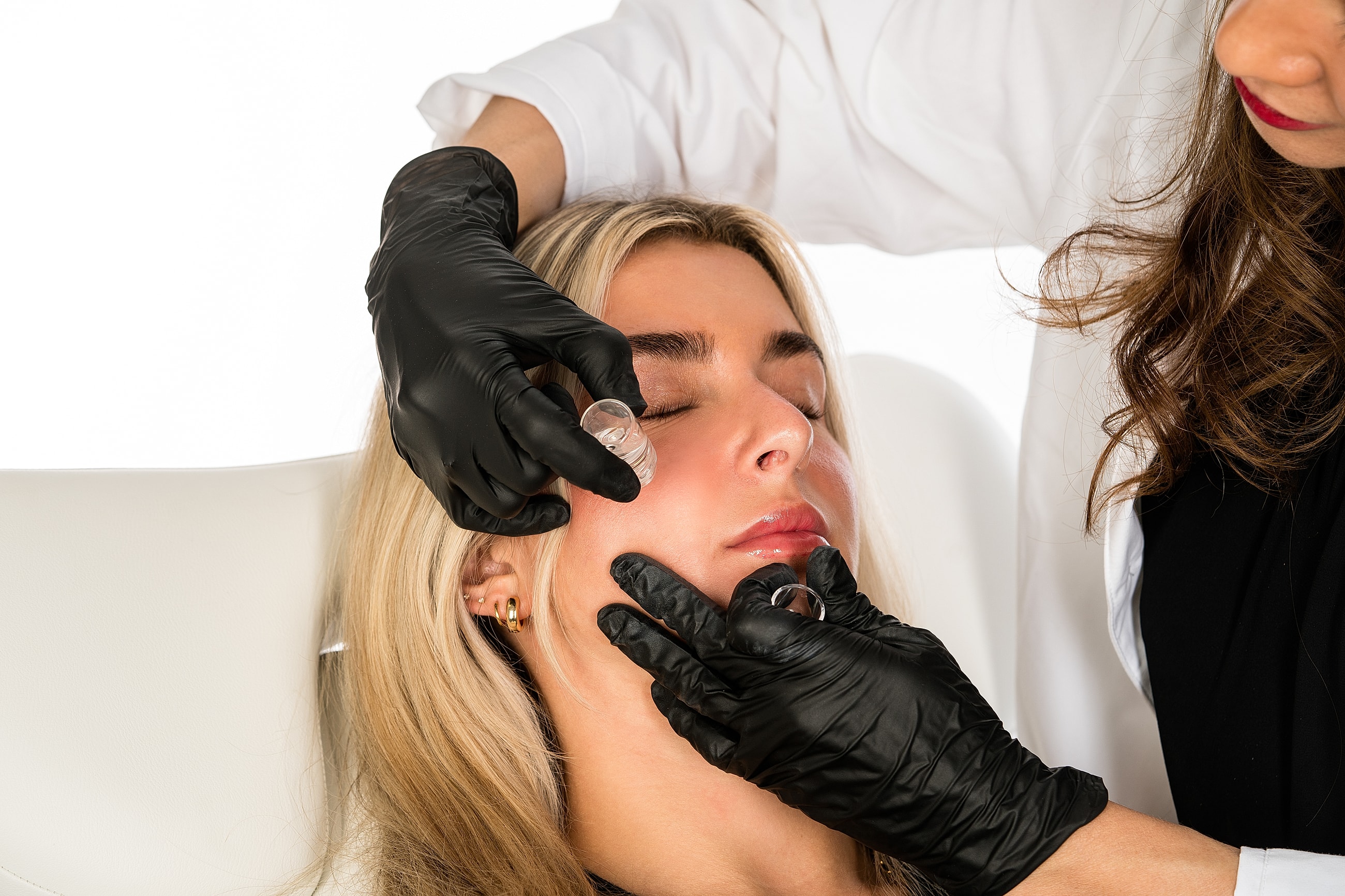 Skincare treatment in progress on a client.