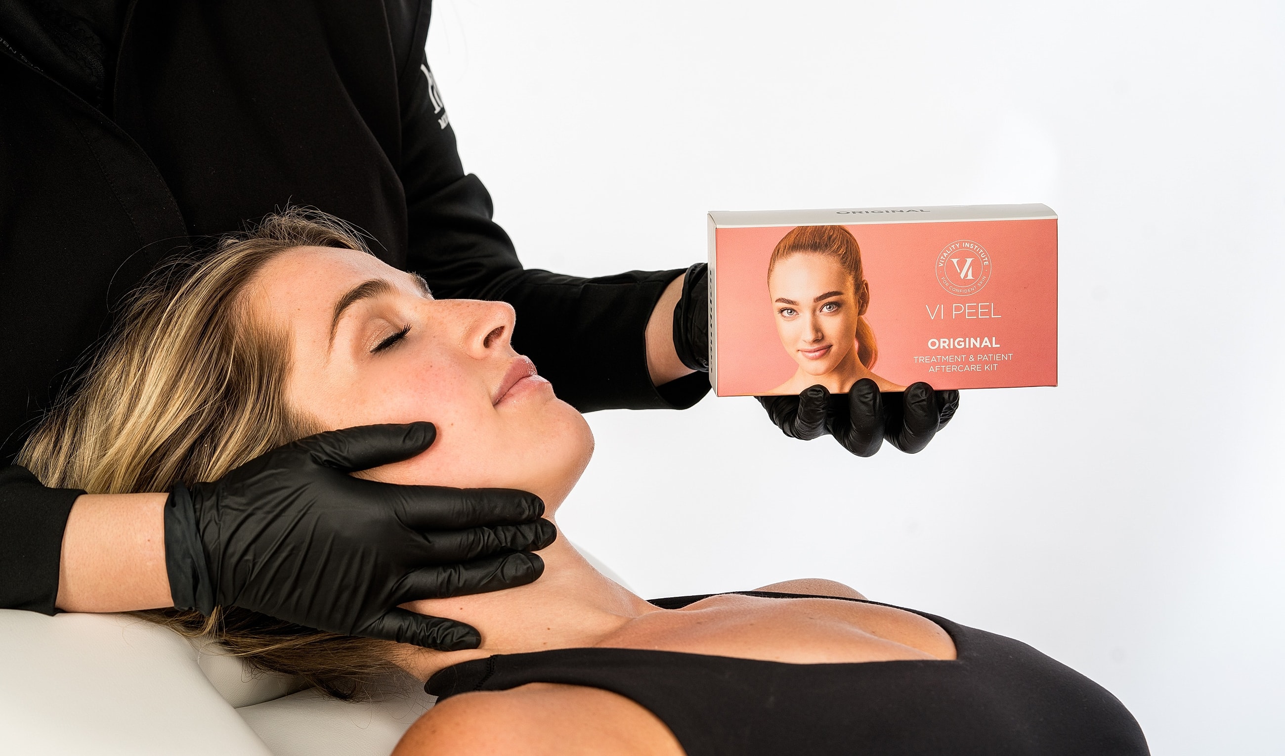 Model with elegant pose and natural makeup.